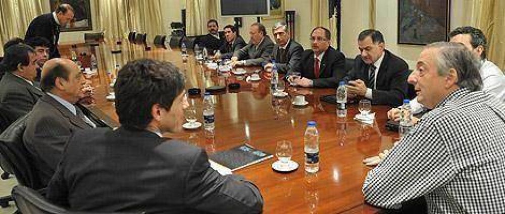GIUSTOZZI EN LA REUNION CON KIRCHNER