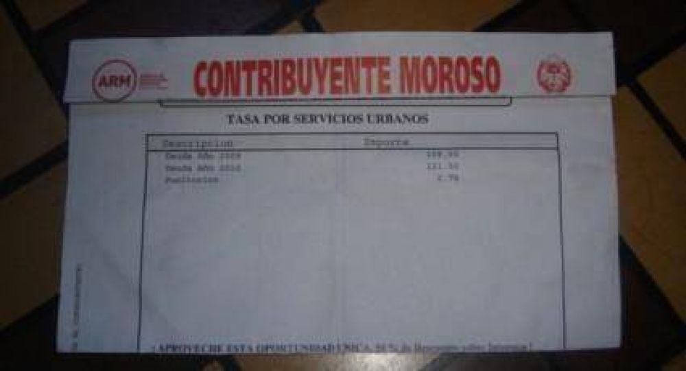 Indignaci�n de vecinos por el rojo furioso en las boletas municipales