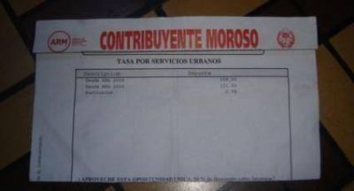 Indignaci�n de vecinos por el rojo furioso en las boletas municipales