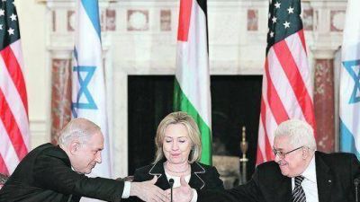 Israel�es y palestinos acuerdan mantener reuniones para la paz