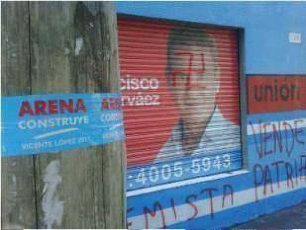 Vicente L�pez Destrozan y pintan una esv�stica en local partidario de De Narv�ez