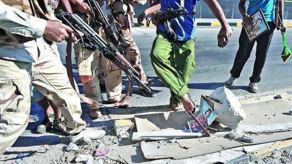 Atacan el b�nker de Kadafi y a�n se combate en Tr�poli