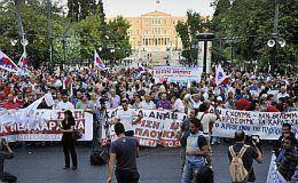 Misi�n del FMI ya revisa las cuentas de Grecia en medio de fuertes protestas