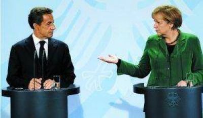 Merkel y Sarkozy prometen una soluci�n duradera contra la crisis