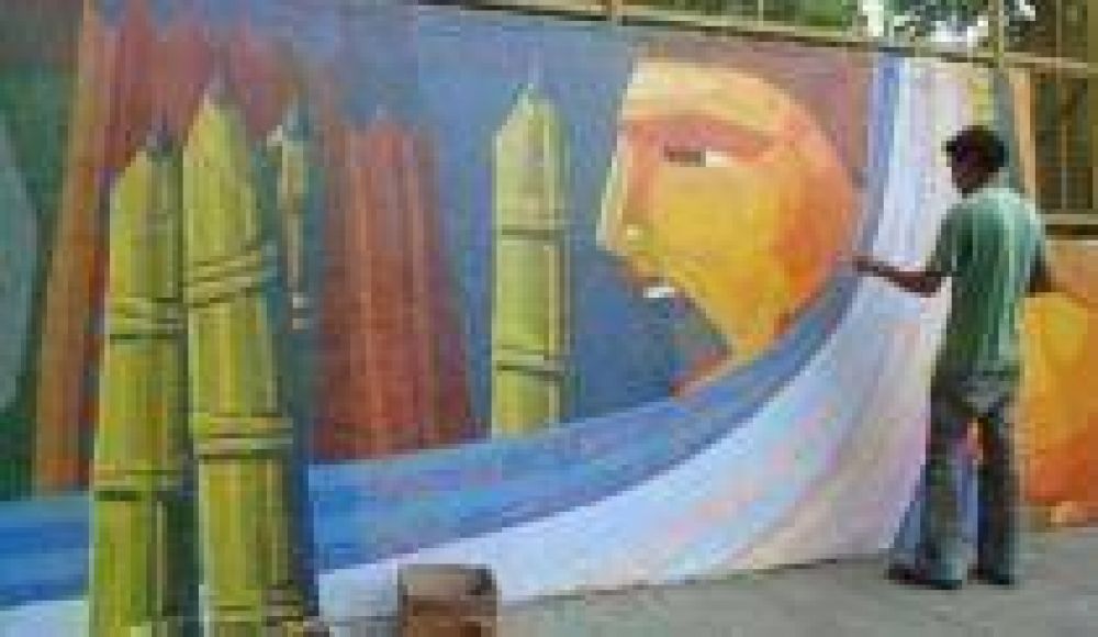 Pintan murales en los paredones de la Escuela Nacional de Quilmes
