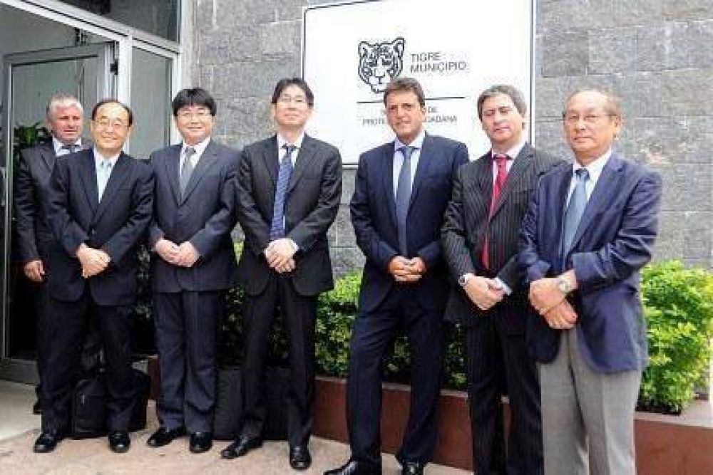 Massa recibi� en Tigre a los due�os de NEC Corporation