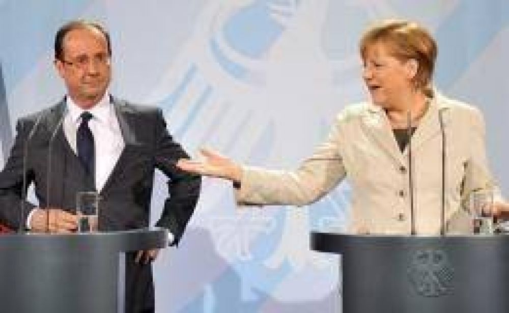 Merkel y Hollande asumen responsabilidades conjuntas y desean a Grecia con euro
