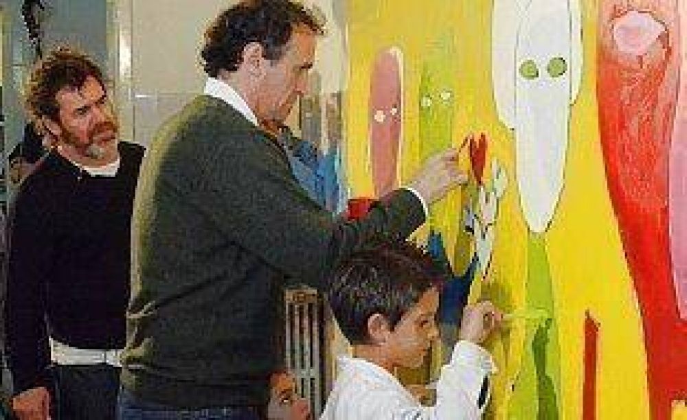 Milo Lockett y Katopodis pintaron murales en un escuela de Villa Ballester 