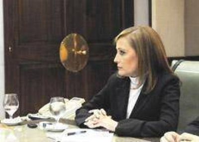 Ministra con un pie afuera