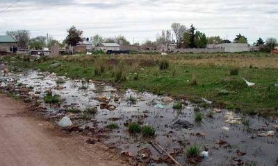 Vecinos del barrio �12 de Octubre� denuncian la utilizaci�n de un bald�o como dep�sito de basura