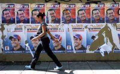 Venezuela define su futuro entre la reelecci�n de Ch�vez o cambiar el rumbo con Capriles