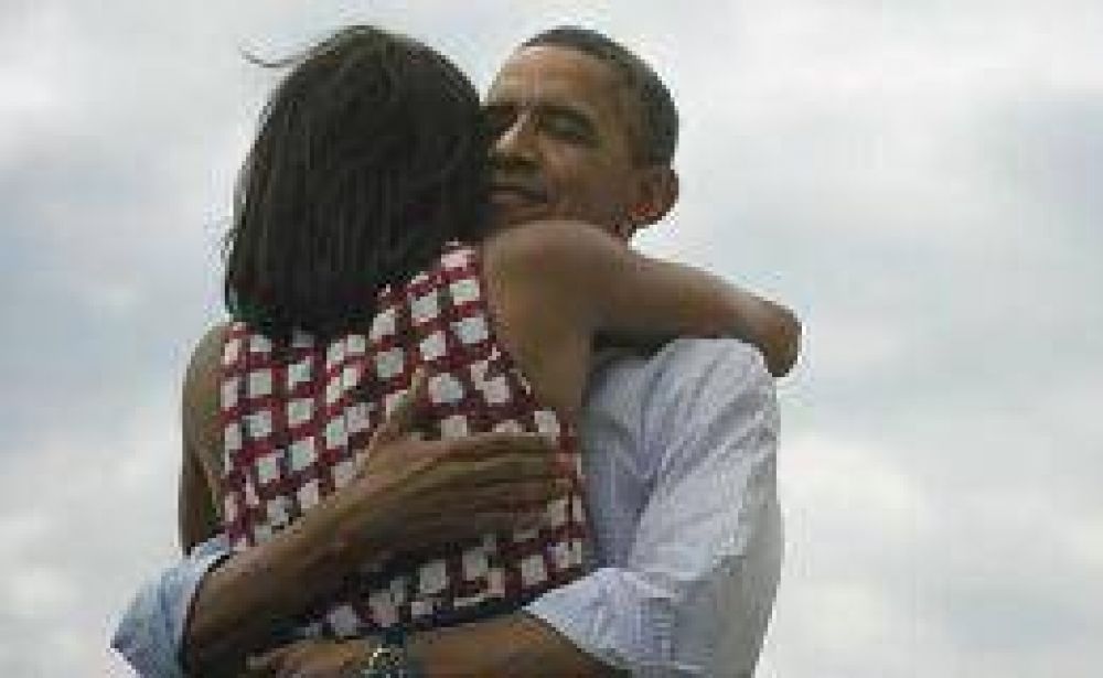 La historia detr�s de la foto de Barack y Michelle