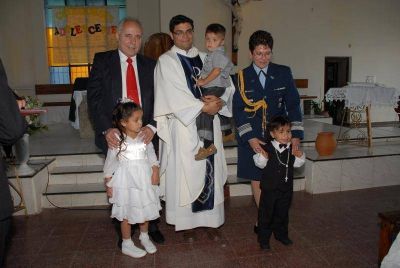 Pte. Per�n - Regueiro fue padrino de tres ni�os junto a la edec�n de la Presidenta Cristina Fern�ndez de Kirchner