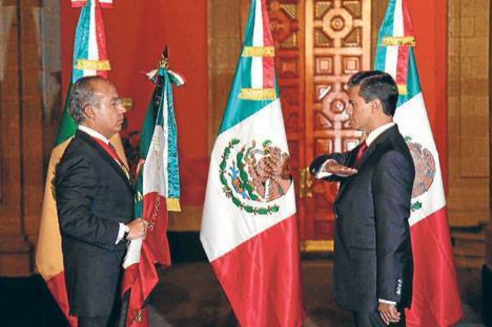 Pe�a Nieto asumi� en medio de violentos disturbios