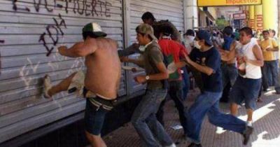 Por saqueos refuerzan guardias a comercios