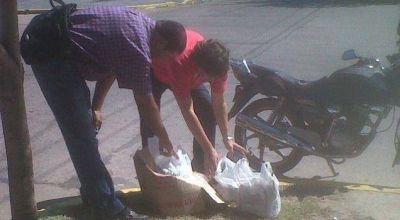 Vuelven a multar a helader�a c�ntrica por tirar basura en la calle