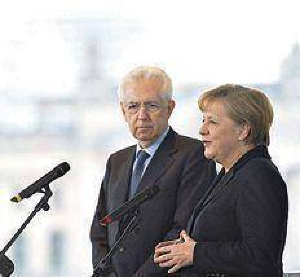Merkel y Monti negocian cara a cara