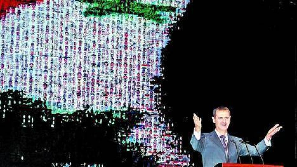 Entrevista al l�der Al Assad en medio del fuego de artiller�a
