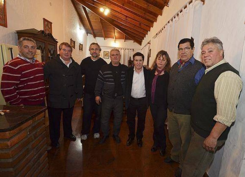 REUNI�N CON COMERCIANTES E INDUSTRIALES DE VILLA POMPEO