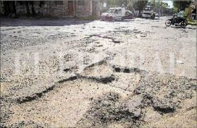 Los baches y una pol�mica abierta