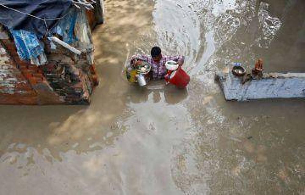 Hallan otros 123 cad�veres y el total de muertos por inundaciones aumenta a 680