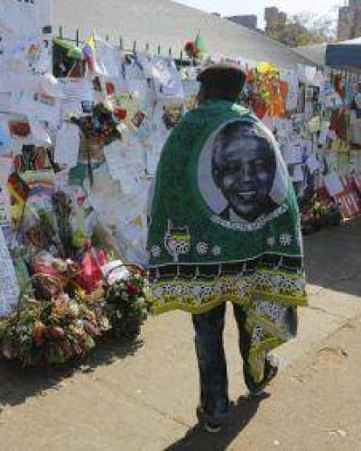 La salud de Mandela mejora en su cumplea�os 95
