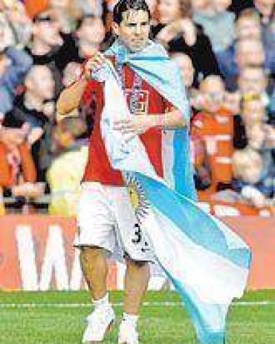 Tevez y Manchester, otro t�tulo para la colecci�n 