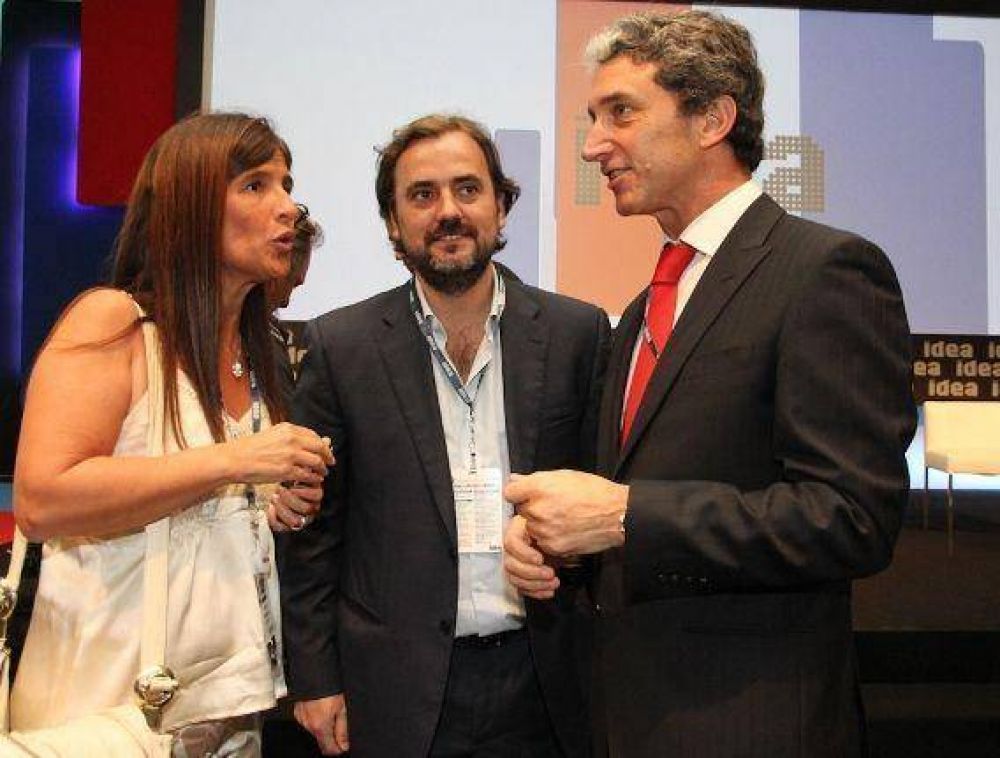 Emiliano Giri y �Pepe� Scioli en el Coloquio de IDEA