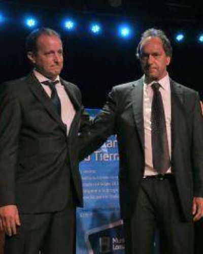 Con Scioli en la cabecera de la mesa
