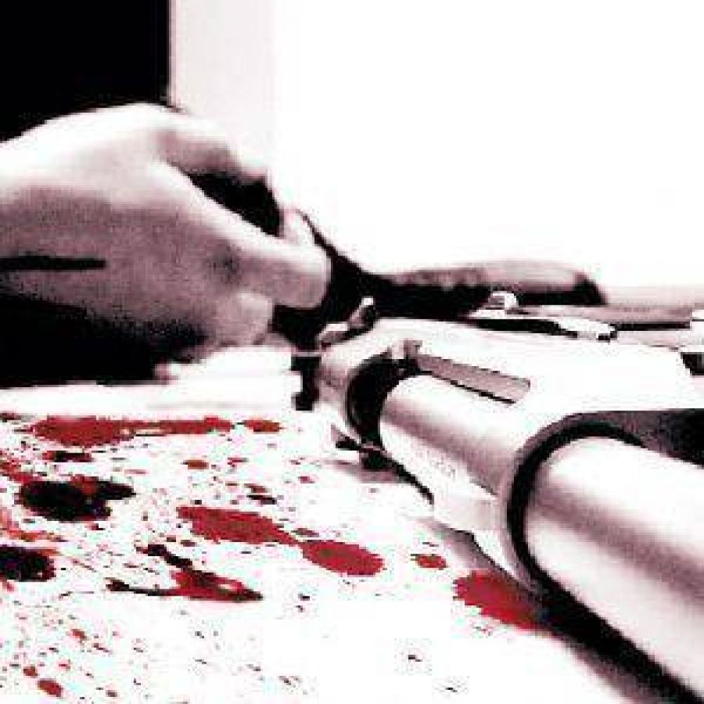 Hallan baleado y muerto a joven en hotel alojamiento