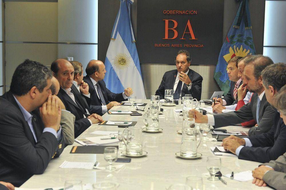 Scioli le prometi� al campo dar marcha atr�s con el 18% en el impuesto rural